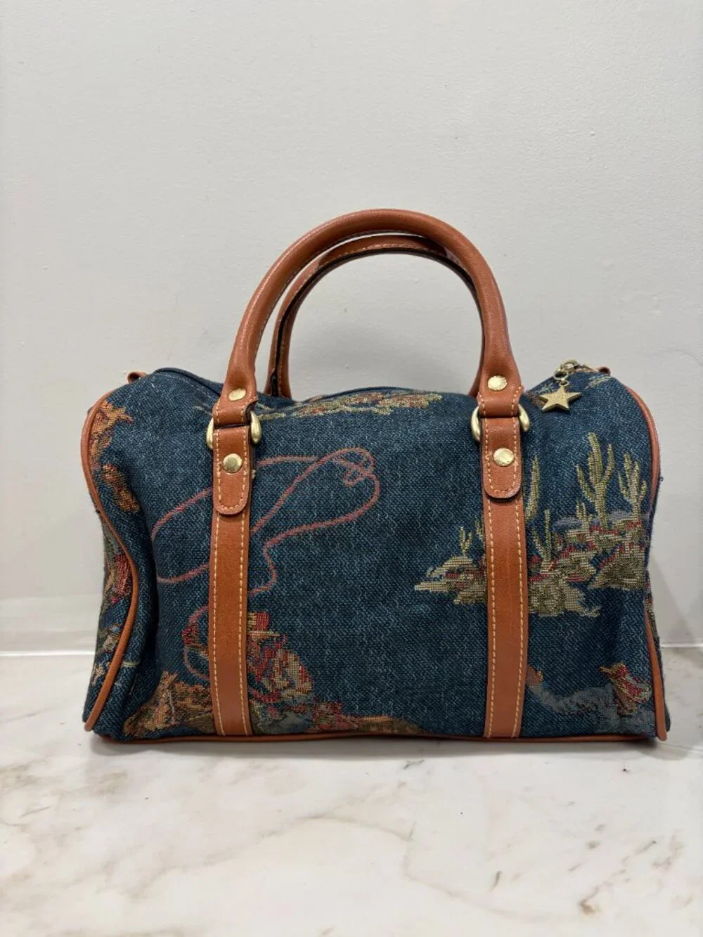 Denim and leather handbag with Southwestern Design